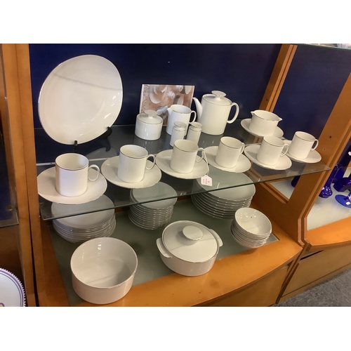 51 - A Thomas of Germany dinner service comprising of coffee cups, saucers, dinner plates, side plates, b... 