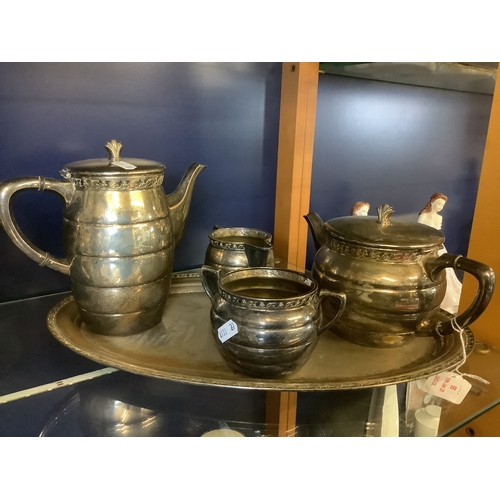 55 - A silver-plated tea set and tray