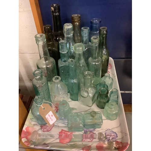 60 - A mixed selection of vintage glass bottles to include Whitbread & Co, R Fry & Co, Bransons Ltd, Bens... 