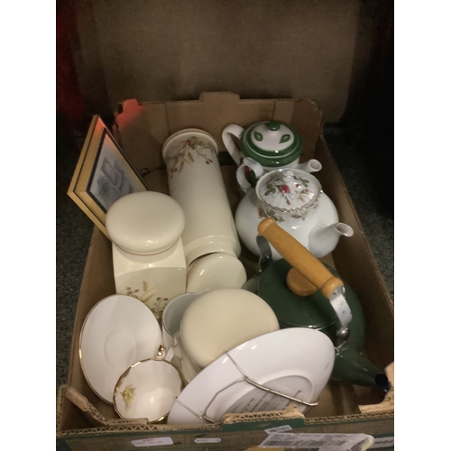 325 - A box of assorted china to include tea-pots, storage jars etc