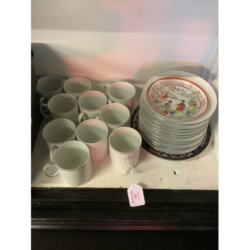 343 - Two Oriental plates together with Thomas of Germany cups and saucers with silver coloured rim's