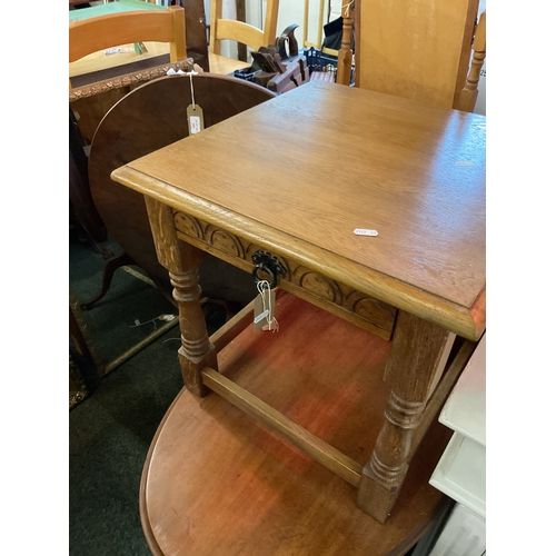 492 - A light oak side table with frieze drawer