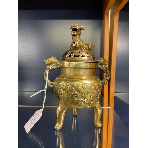 15 - A Chinese bronze censer with floral and lion decoration