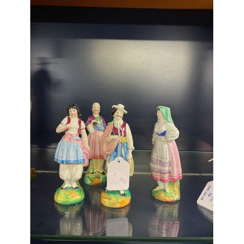 16 - A set of four Continental porcelain figures