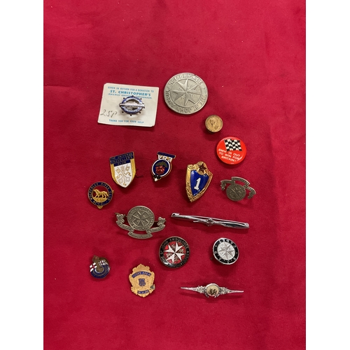 A mixed selection of assorted enamel badges