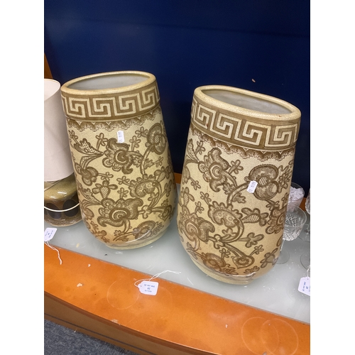 39 - A pair of crackle glazed oval vases with Greek Key and floral decoration