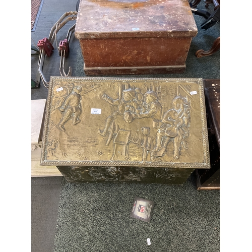 530 - A vintage brass coal box with embossed decoration