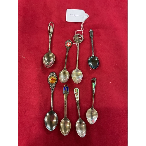 148 - A selection of enamel tourist spoons