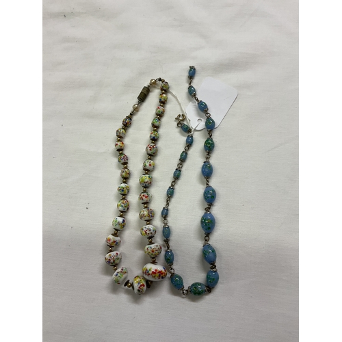 221 - Two vintage porcelain beaded necklaces