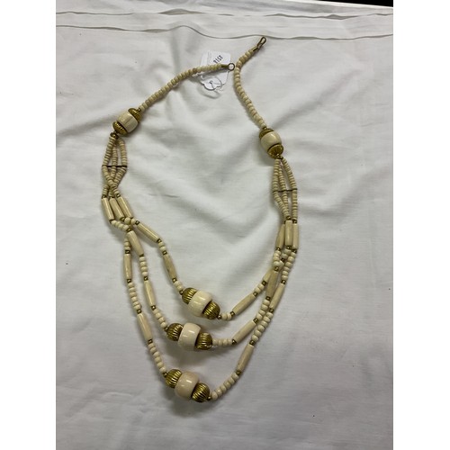 225 - A vintage gold tone and bovine necklace