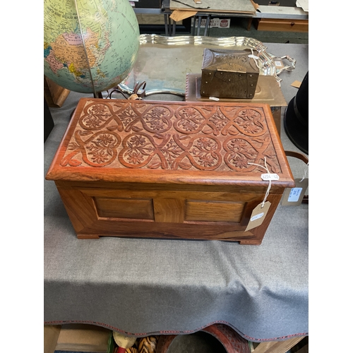 276 - A carved wooden jewellery box