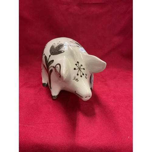 64 - A David Sharp Rye Pottery Pig in brown colour way