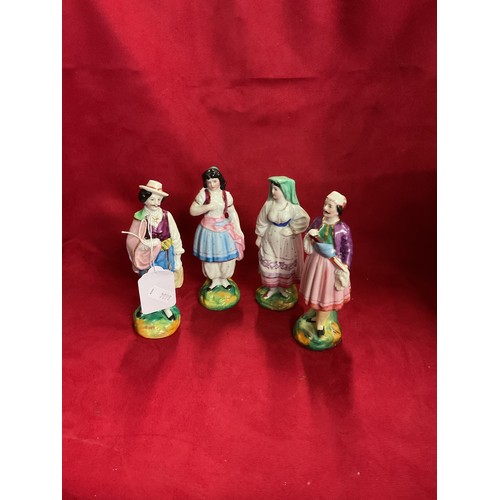 128 - A set of four Continental porcelain figures