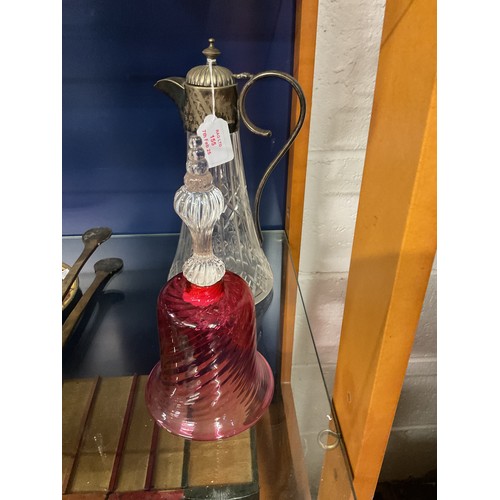 155 - A crystal cut glass and silver plated claret jug together with a vintage cranberry bell