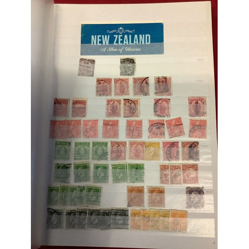 177 - Am album housing a large collection of New Zealand stamps