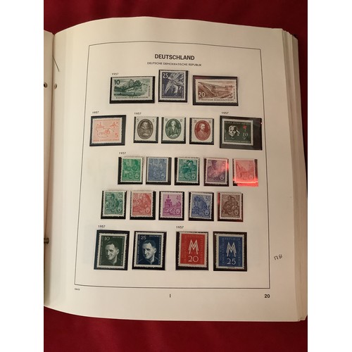 194 - A folder housing a collection of East Germany stamps dated from 1949-1975 to include an almost compl... 