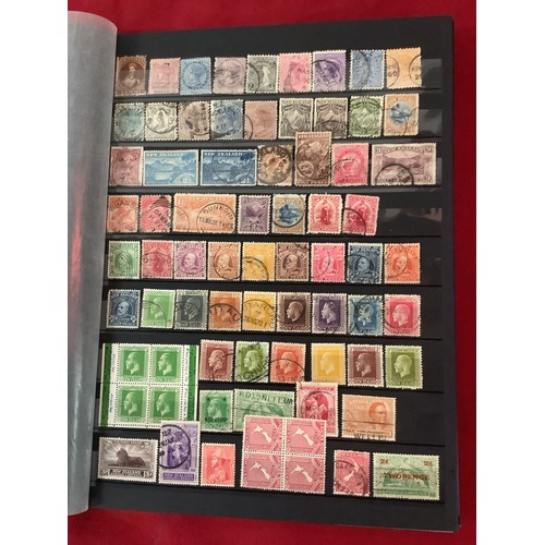 198 - An album housing a large selection of New Zealand stamps mint and used dating from 1857 to 1996