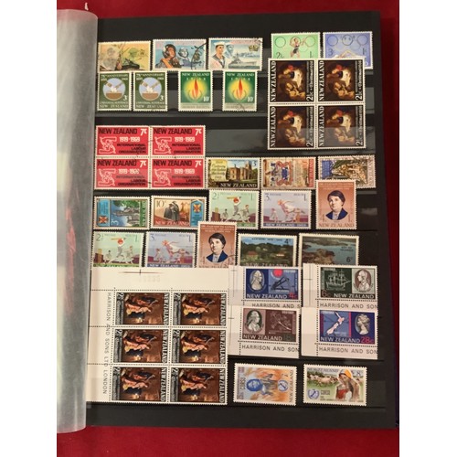 198 - An album housing a large selection of New Zealand stamps mint and used dating from 1857 to 1996