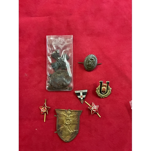 208 - A selection of assorted German and Russian badges