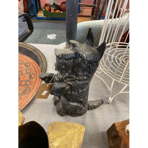 398 - A vintage cast iron dog door stop