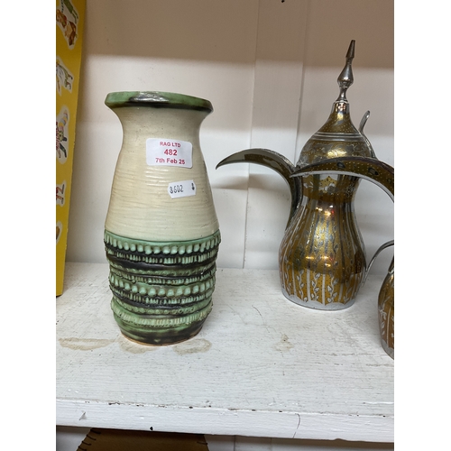 482 - A cream and green studio pottery vase