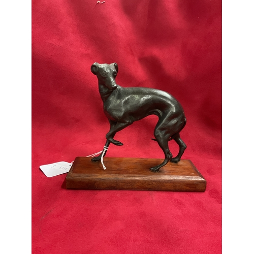 259 - A bronze figure of a greyhound mounted on a wooden base