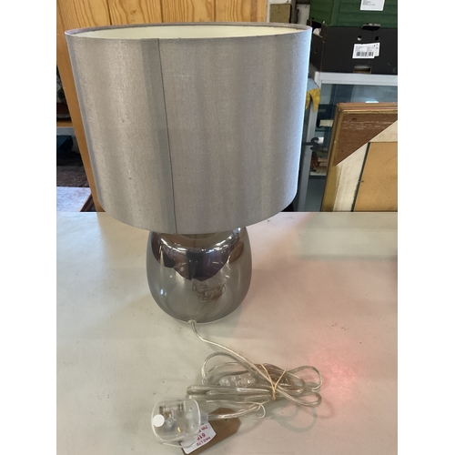 619 - A silvered glass table lamp with grey shade