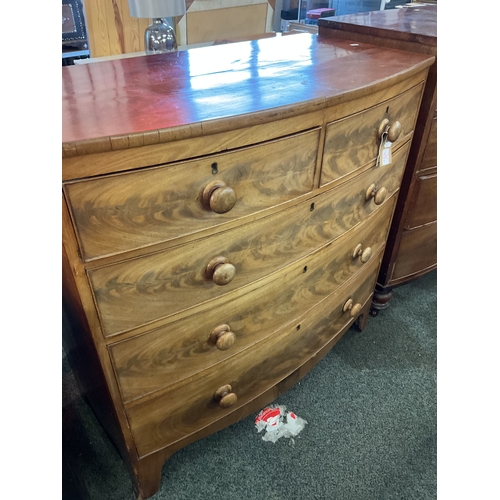 622 - A Victorian mahogany bow front chest of two short over three long graduating drawers with shaped apr... 