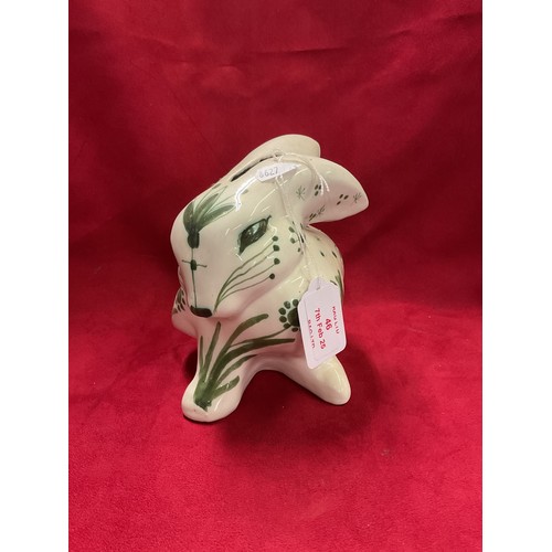 46 - A David Sharp Rabbit money box in green colour way