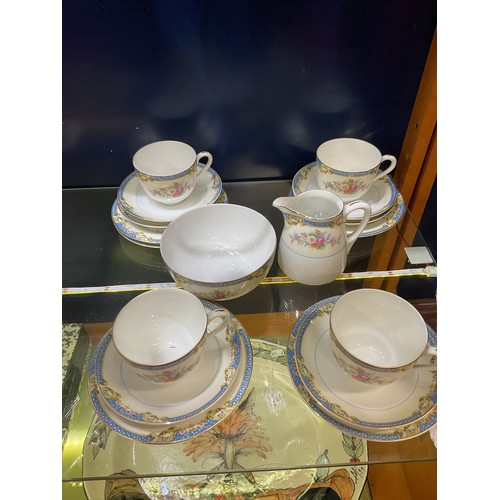 116 - A Noritake part tea-set comprising cups, saucers, plates, milk jug and sugar bowl