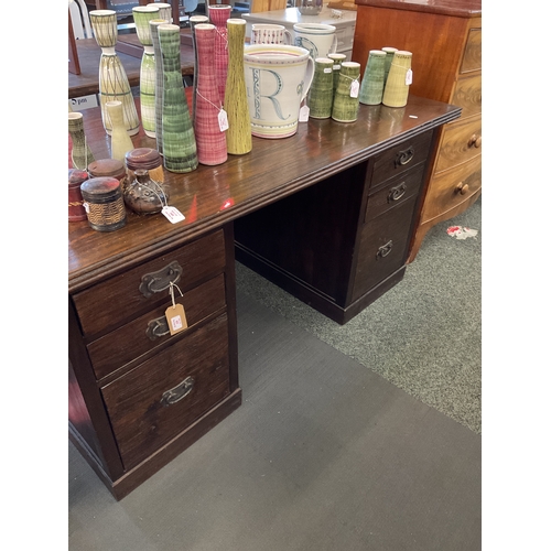 623 - A large Angora Lombok hardwood pedestal desk with six drawers