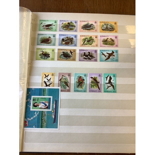 142 - An album housing a quantity of Commonwealth unmounted mint stamps to include Kiribati, Caicos Island... 