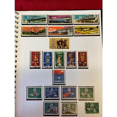 136 - An album housing a selection of unmounted mint and used East Germany stamps