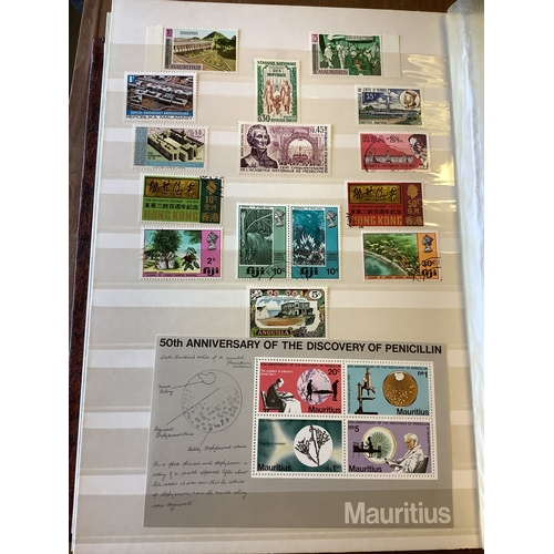 141 - An album housing a large selection of World Stamps to include Mali, Jamaica, Canada, etc