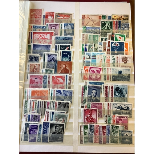 144 - An album housing a collection of Eastern Europe stamps used and mint