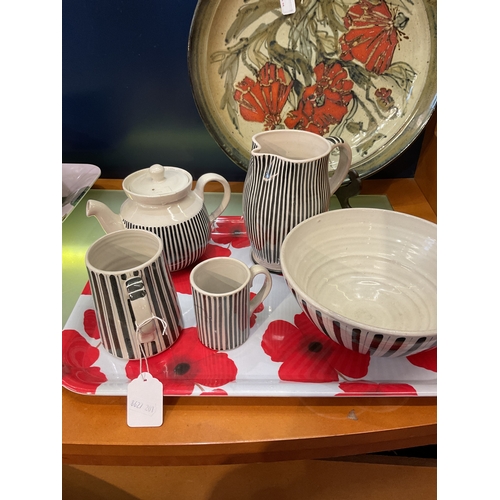 67 - A group of five Rye Pottery cottage and candy stripe decoration tea pot, jug, bowl and two mugs