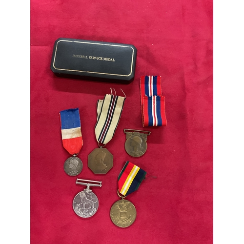 176 - A selection of assorted medals and a medal box