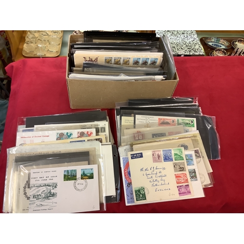 136 - A box of modern Commonwealth covers and first day covers to include Introduction Of Decimal Coinages... 