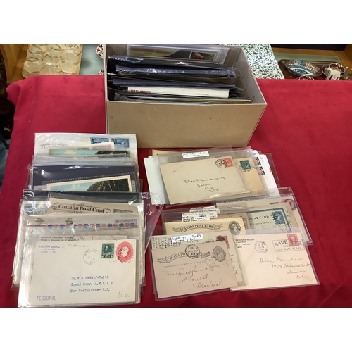 137 - A box of assorted Canada stock of covers and postcards to include VIA Rail, Air Mail, Canada's Coat ... 