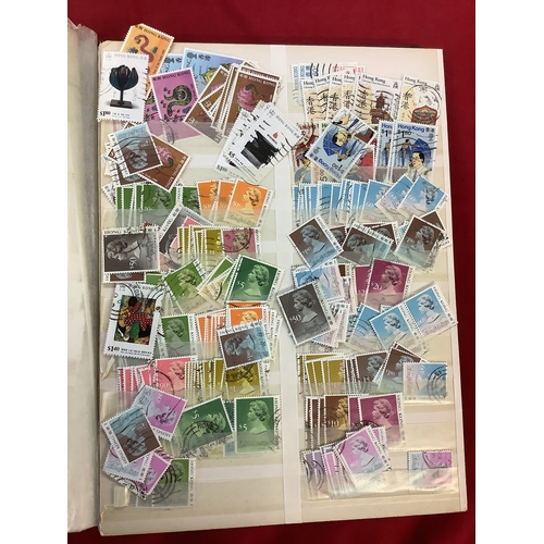 138 - An album housing a large quantity of Hong Kong stamps ''Lunar New Year', 'Olympics', etc