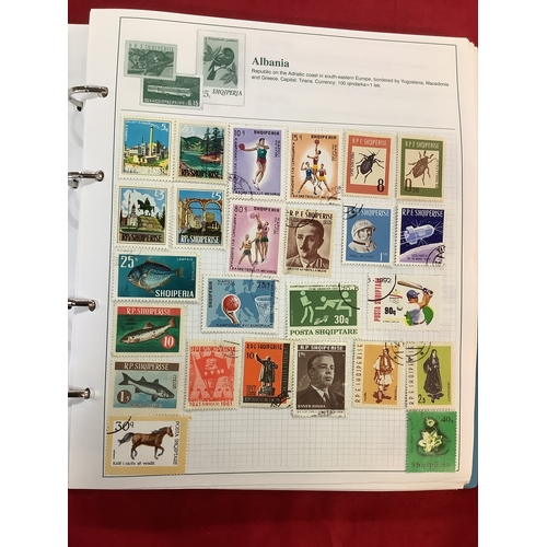 144 - A Swiftsure album housing a quantity of World stamps to include 'Ascension Island', 'Bermuda', 'The ... 