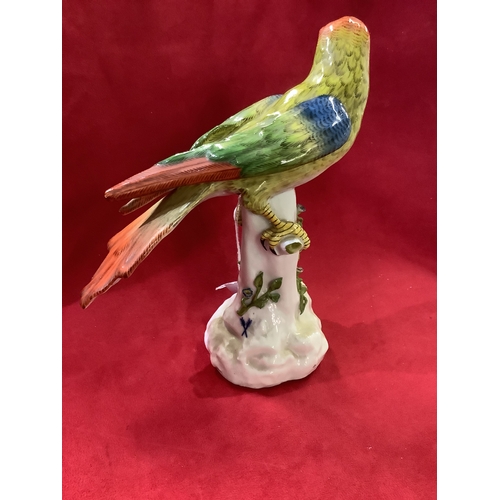 1A - A Meissen model of a parrot perched on a tree stump with blue crossed swords mark 8 1/4