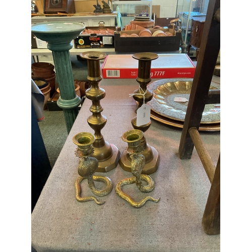 392 - Two pairs of brass candlesticks