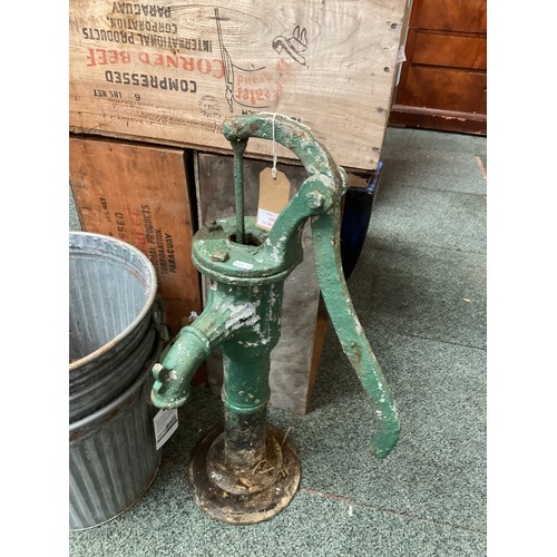 555 - A vintage cast iron water pump in working order