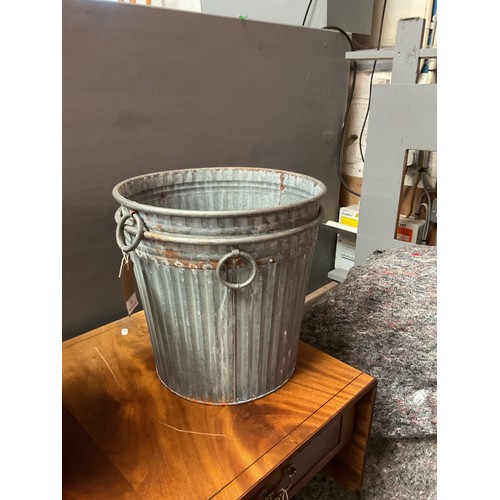 558 - A pair of galvanised garden planters