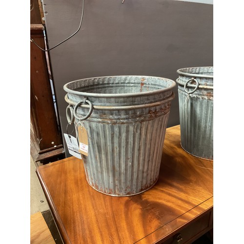 559 - A pair of galvanised garden planters