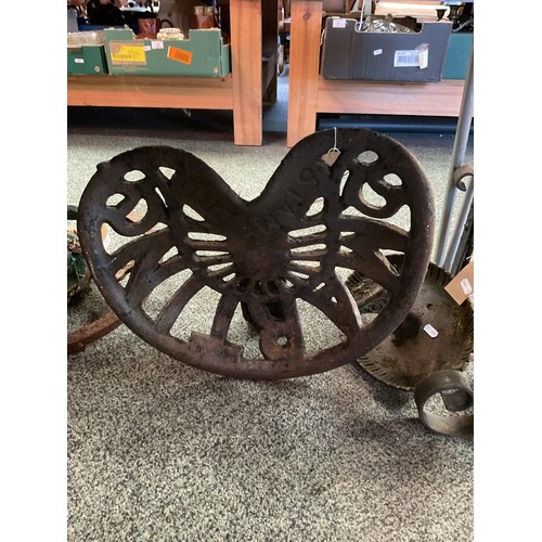 563 - A vintage iron tractor seat