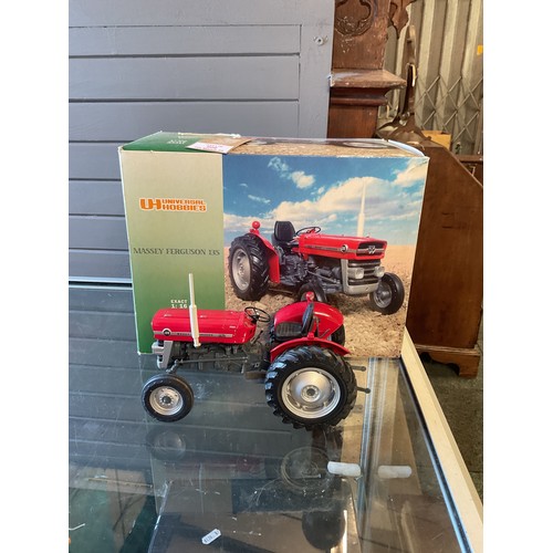 609 - A Universal hobbies 'Massey Ferguson' 135, 1.16 scale tractor boxed