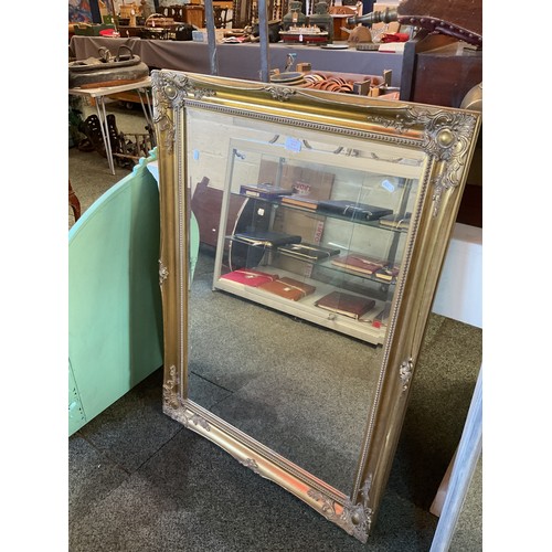 615 - A large gilt framed mirror