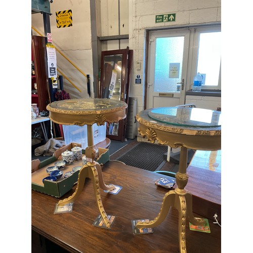 625 - A pair of gold painted three legged occasional tables